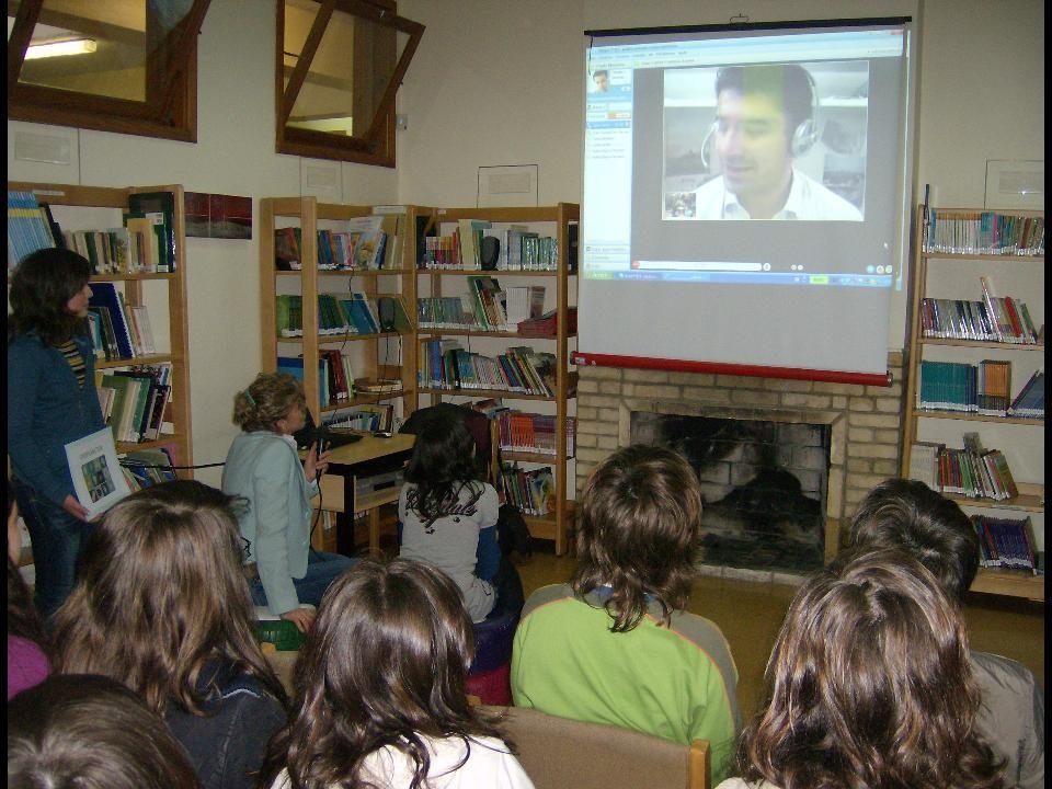 José speaking to a class of children via video conference